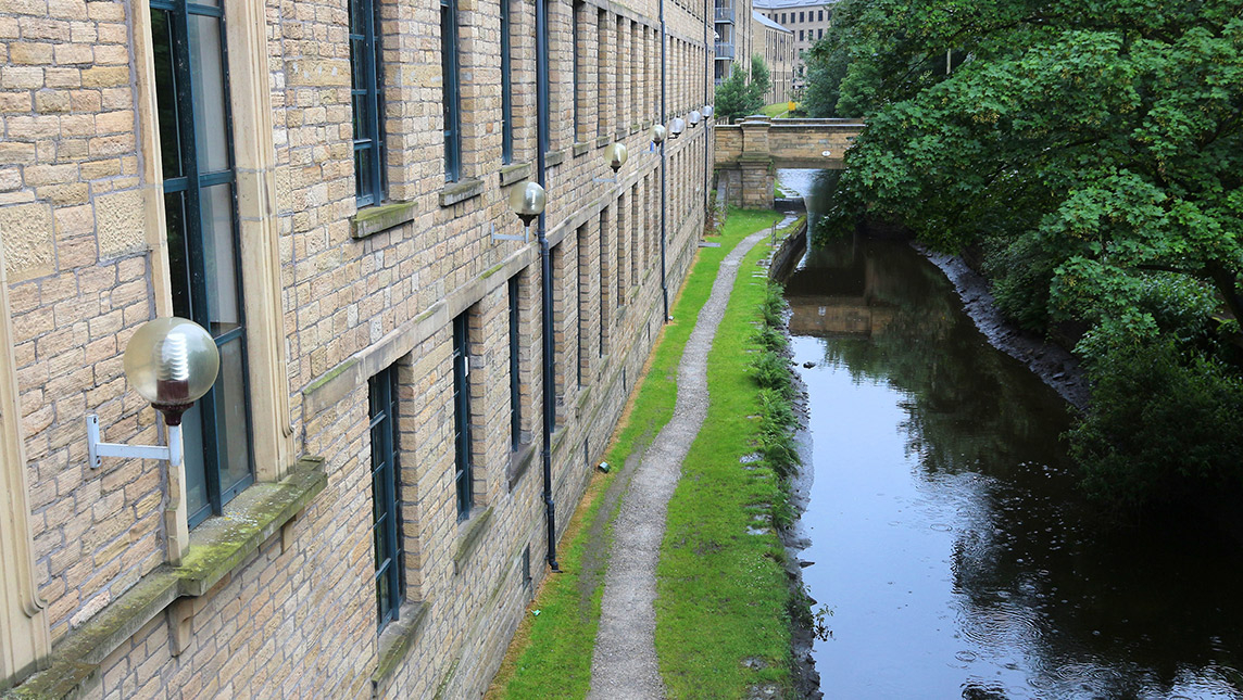 The University of Huddersfield buildings by the canal.
